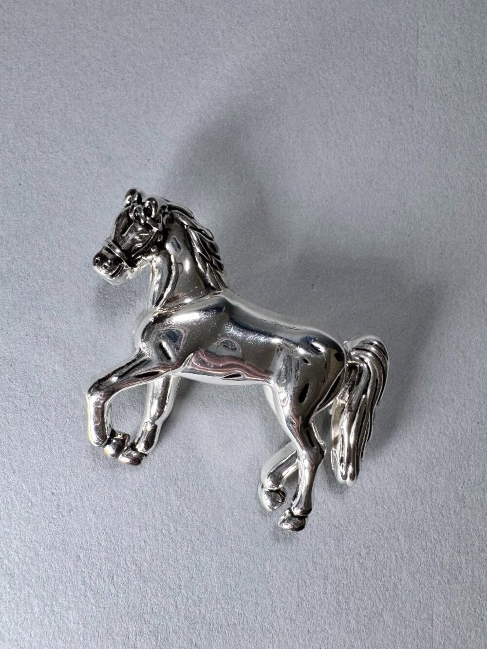 Vintage Silver-Tone Horse Brooch – Marked “BEST”